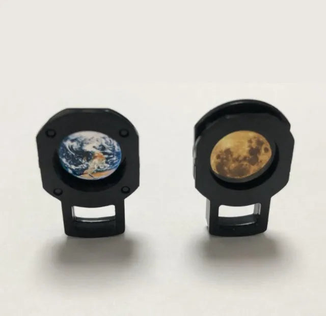 White ABS star projector lamp with adjustable hose, projecting an image of the earth onto a wall.