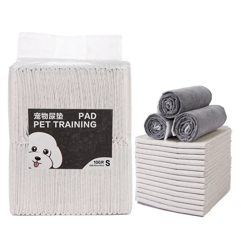 Pack of disposable pet urinal pads showing layered construction and size options S, M, L, XL for dogs and cats.