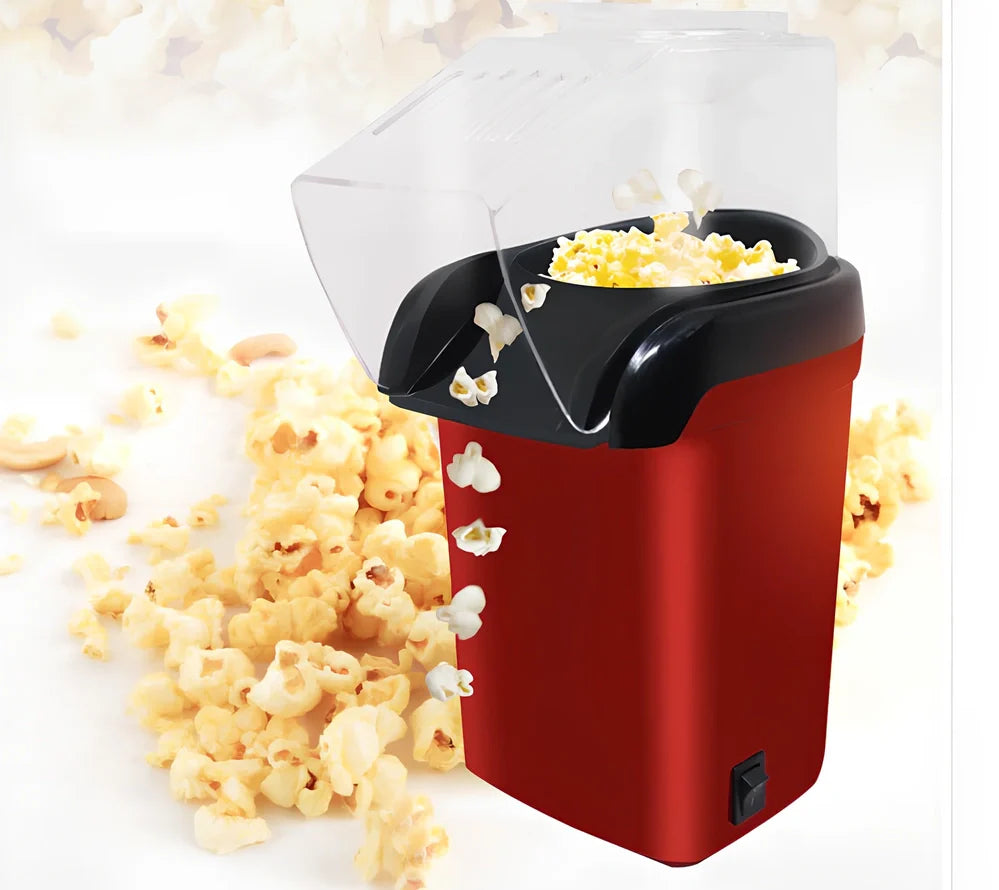 Red compact popcorn machine with aluminium cooking chamber and 1200W power rating for home use