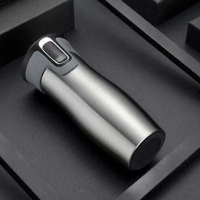 Black vacuum insulated stainless steel travel flask with push-button lid, 450ml capacity.