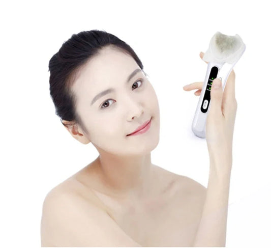 Electric Ultrasonic Facial Beauty Device in white, compact and USB-powered for skincare