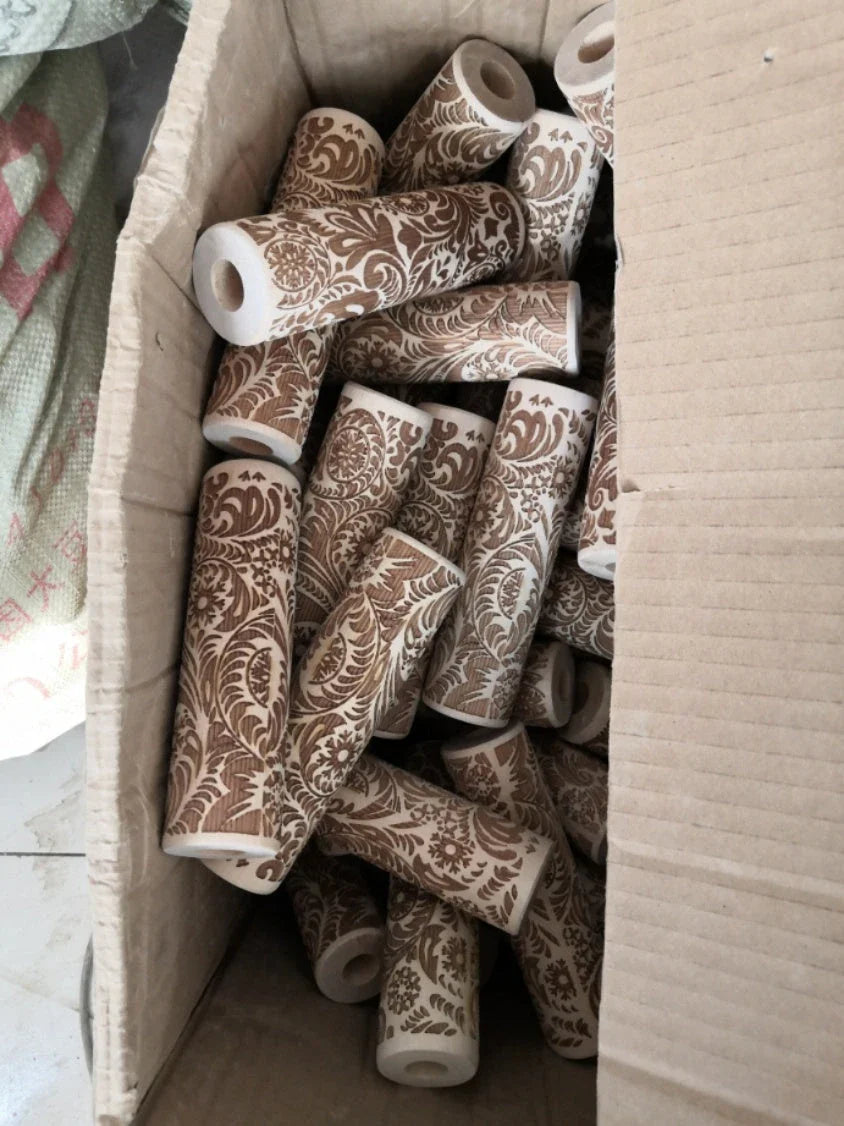 Festive rolling pin with embossed Christmas designs for easy imprinting on dough