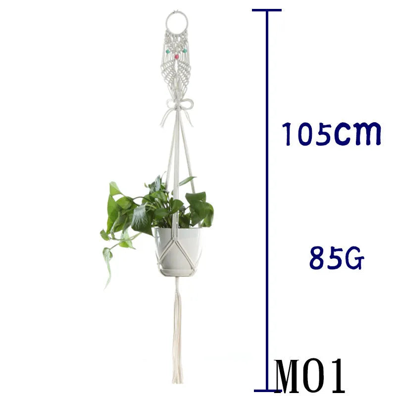 Handmade beige cotton rope net bag holding a plant pot, showing its textured sling design.