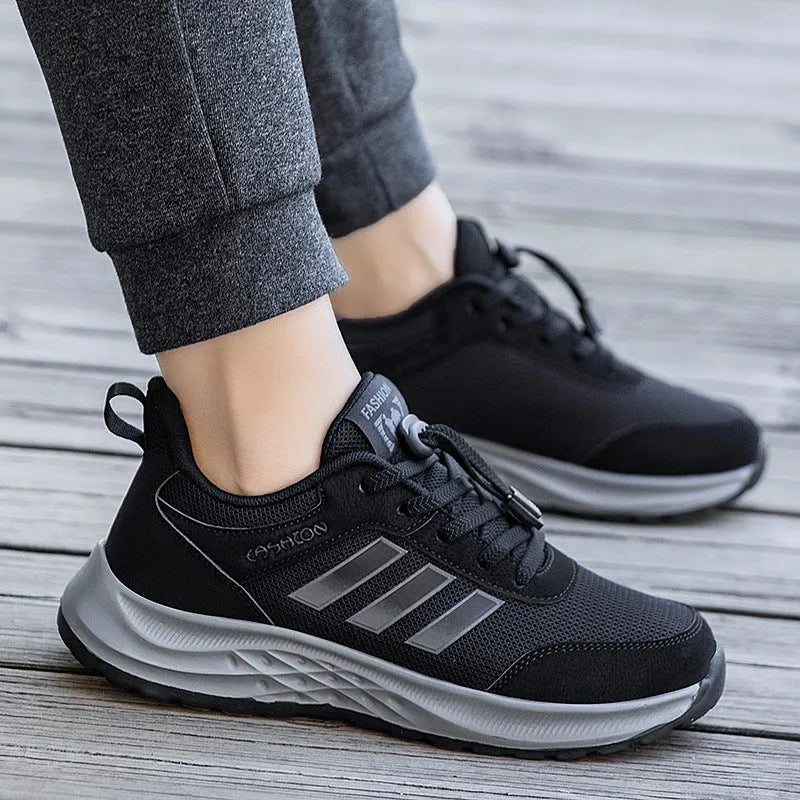 Unisex slip-on casual shoes with mesh upper and elastic band in various colours.