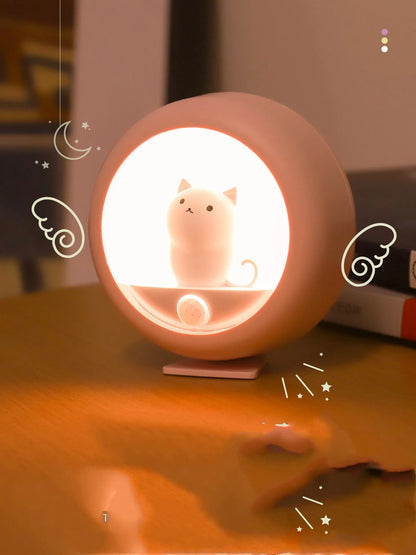 Baby bedside sleep lamp showing orange, pink and white colour modes with projection feature