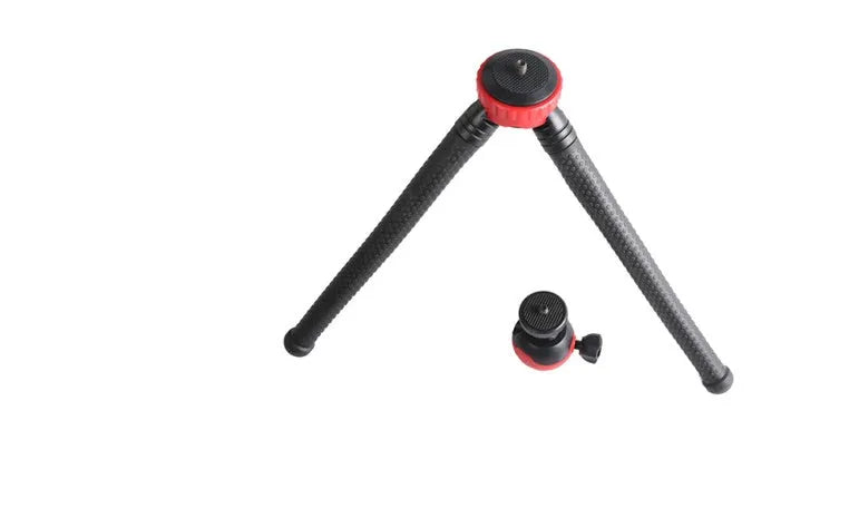 Black octopus tripod with flexible rubber legs wrapped around a pole, holding a smartphone.