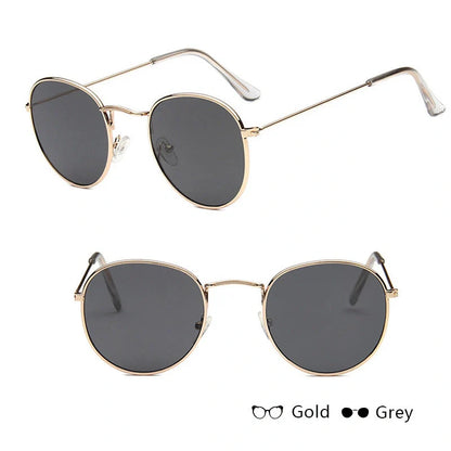 Stylish retro sunglasses for women with metal frame and glass lenses