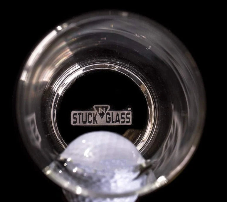 Elegant beverage glass with a unique golf ball embedded within the crystal-clear borosilicate frame, perfect for serving cocktails, iced tea, and desserts.