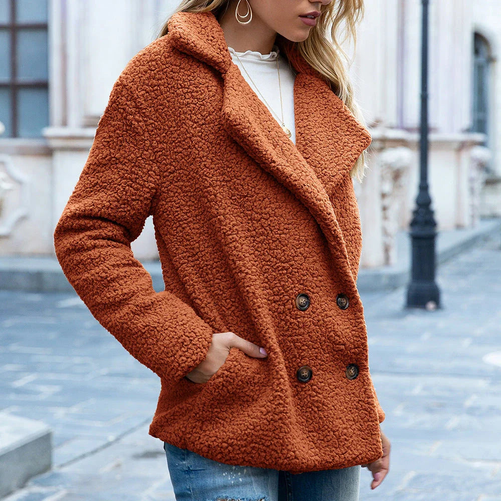 A cozy, plush winter jacket for women in a variety of stylish colors and sizes