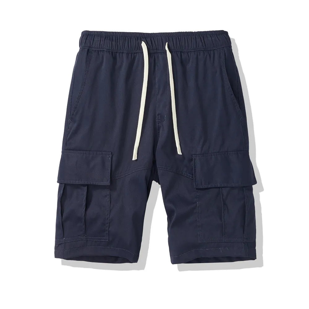 Men's loose cropped pants in Korean style with multiple pockets, shown in brick red colour
