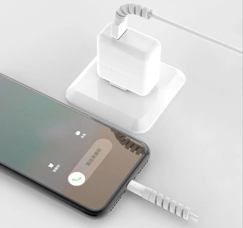 Plastic charging cable protector sleeve shown in various colours including black, blue, pink and yellow.