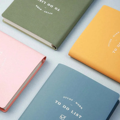 Simple Style A6 todo list notebook in blue, green, pink, or yellow with PU cover and 96 pages.