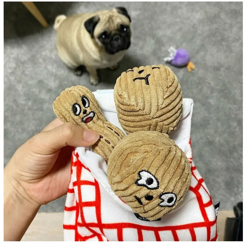 Dog sniffing toy set with two walnut pieces, one peanut piece and snack bag with rustling paper