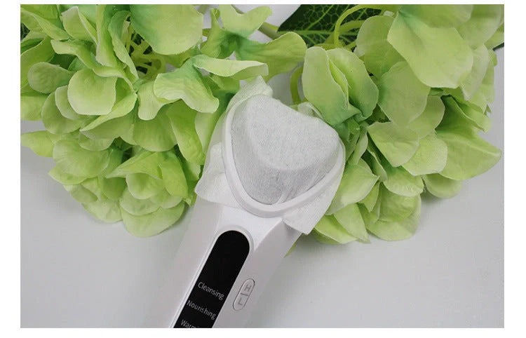 Electric Ultrasonic Facial Beauty Device in white, compact and USB-powered for skincare