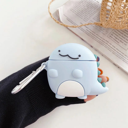 Blue silicone case with baby dragon design for Apple AirPods 1, 2, and 3 models.
