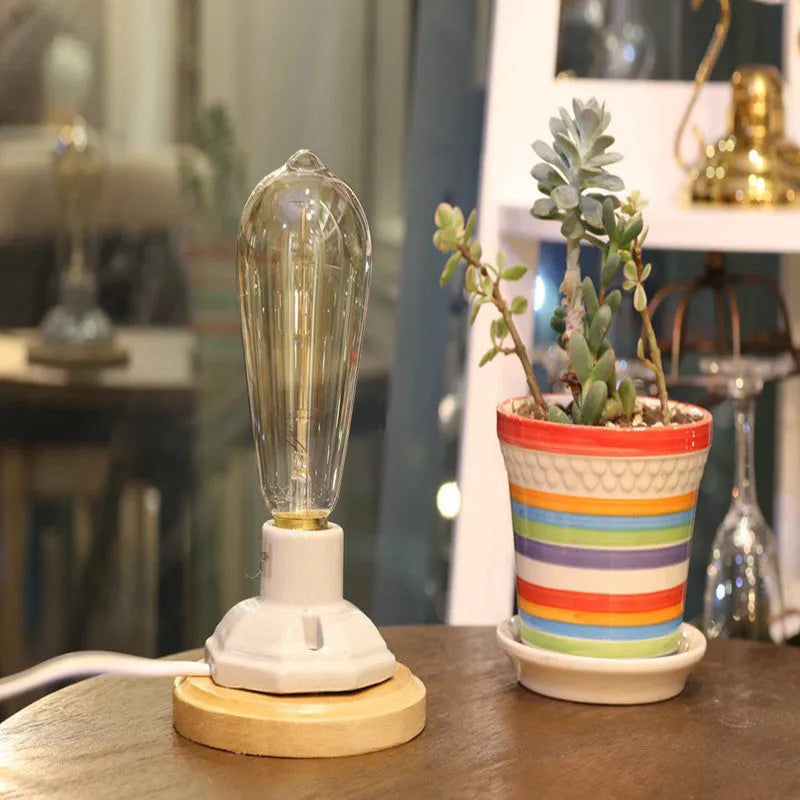 Retro ceramic table lamp with wooden base and glass shade in American Country style.