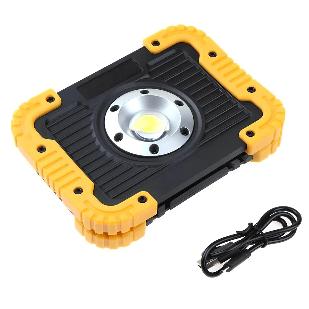 LED camping lantern with rotatable support showing USB ports and battery indicator