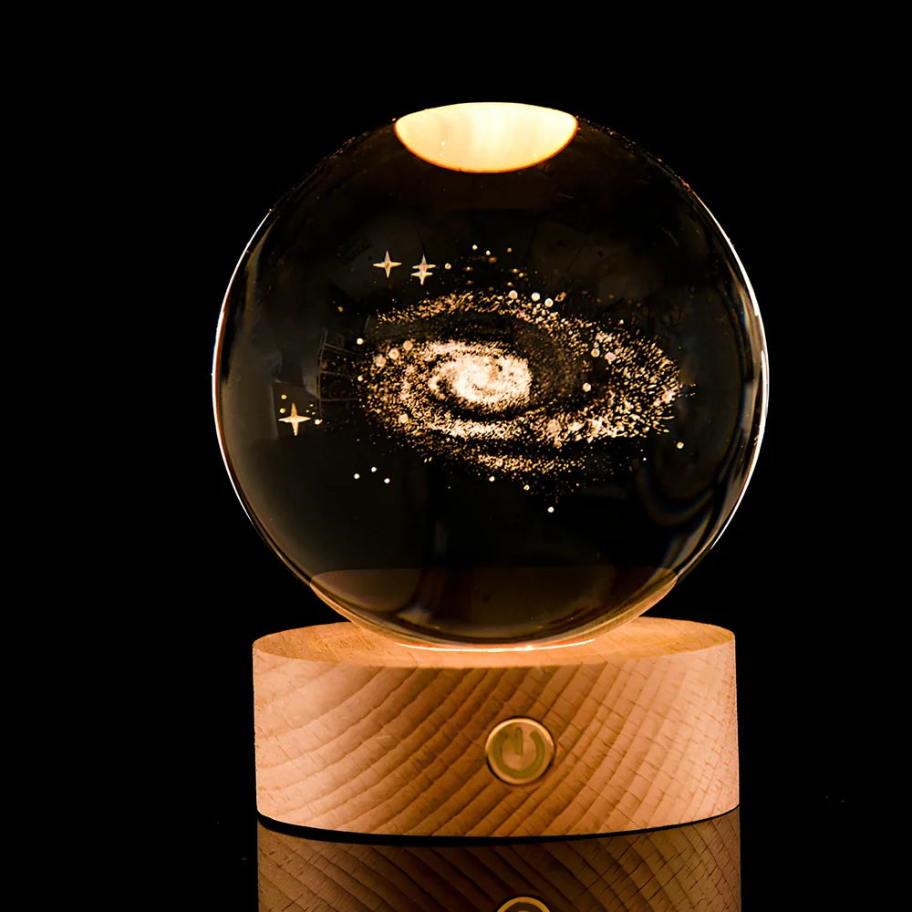 Luminous Galaxy Crystal Ball with 3D laser inner carving showing celestial patterns and gradient lighting