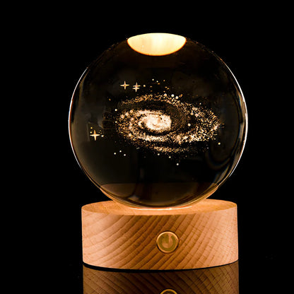 Luminous Galaxy Crystal Ball with 3D laser inner carving showing celestial patterns and gradient lighting