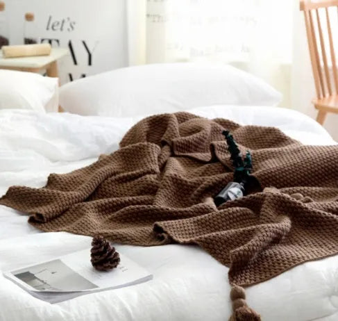 Nordic fringed knit ball acrylic blanket in beige colour measuring 130×170cm