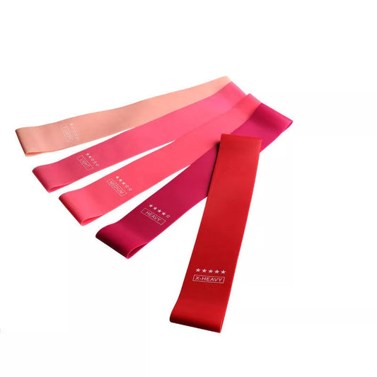 Yoga tension band set in five colours with varying resistance levels for fitness and Pilates