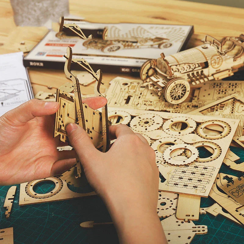 Premium model wooden train kit with 308 precision-cut wooden pieces for a rewarding DIY assembly project
