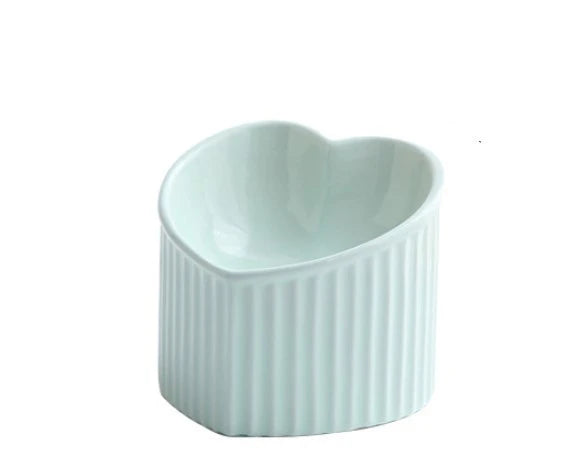 Elevated ceramic pet bowl with tilted design for comfortable and healthy feeding