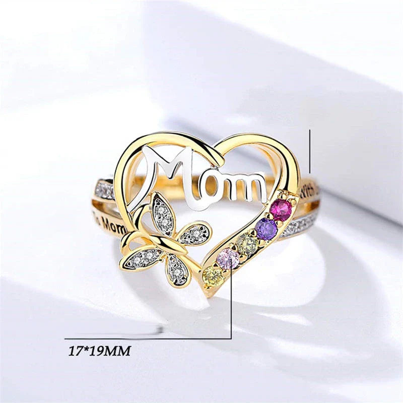 A shimmering heart-shaped jewelry set with a multicolor rhinestone design, including a ring and coordinating necklace, a thoughtful Mother's Day gift.