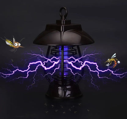 White solar mosquito lamp for outdoor garden use with solar panel and LED lights.