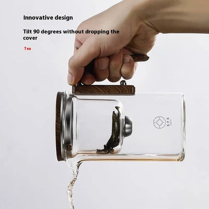 Elegant glass teapot with magnetic water separation filter and wooden handle for brewing and pouring loose leaf tea
