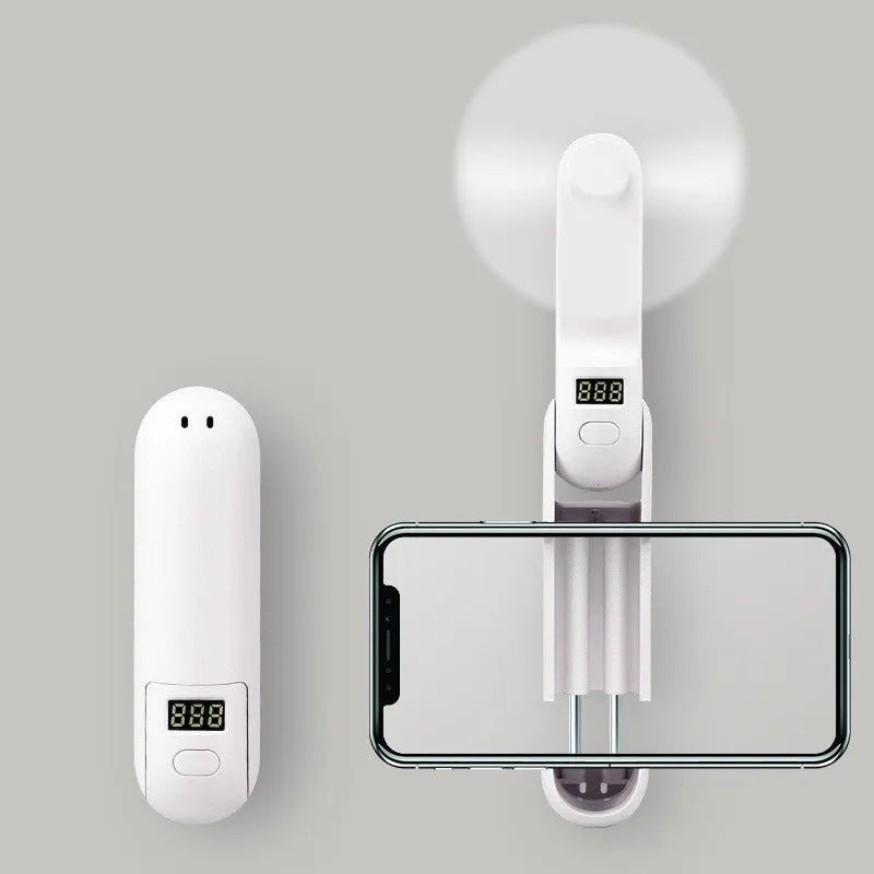 Folding mini fan in green, pink, or white with collapsible design and USB charging port