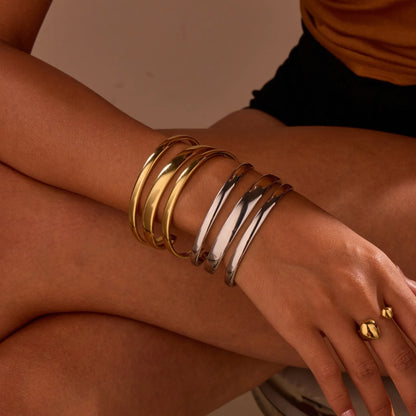 Geometric stainless steel bracelet with simple opening design and 18K gold electroplating