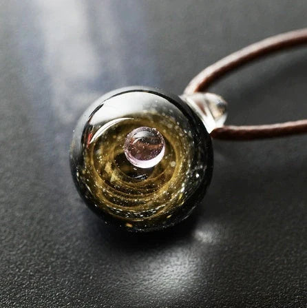 Cosmic Nebula Pendant Necklace featuring a unique blue starry sky design