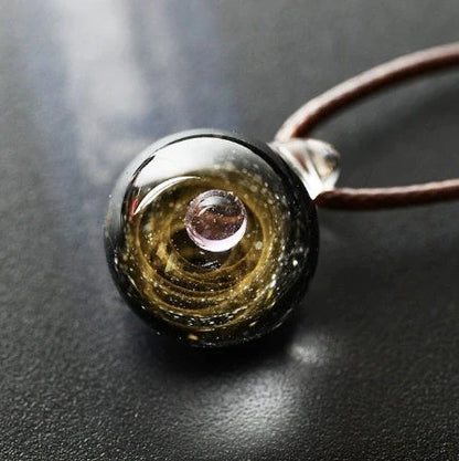 Cosmic Nebula Pendant Necklace featuring a unique blue starry sky design