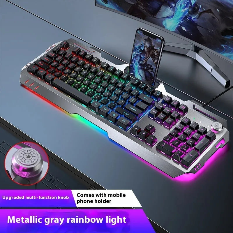 Aluminium alloy mechanical gaming keyboard with rainbow lighting, shown with a macro mouse and gaming headset.