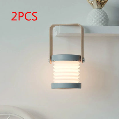 Foldable touch dimmable LED night light showing table lamp and lantern configurations