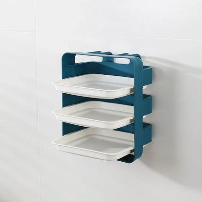 Wall-mounted kitchen shelf with stackable trays in navy blue, white, and coffee colour options