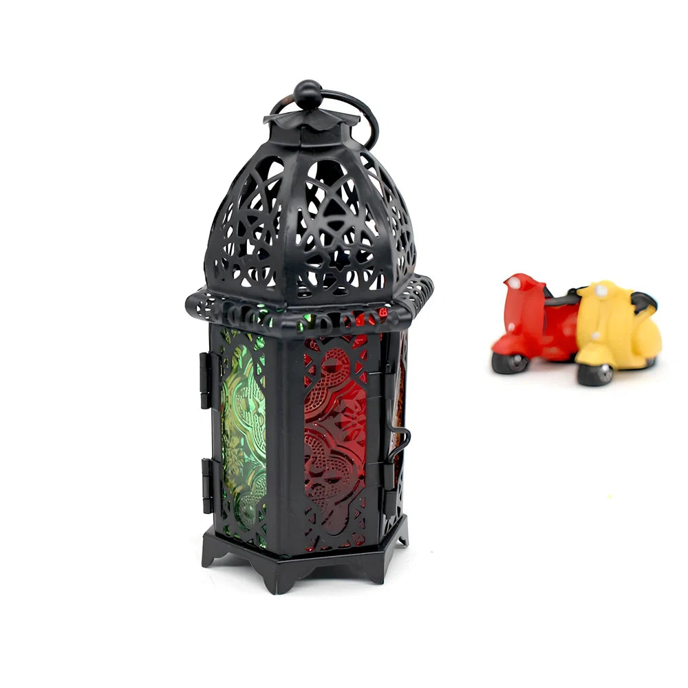 Wrought iron candle holder with 16cm height and 7cm diameter in black finish showing hanging design