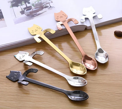 Stainless steel coffee spoon with cartoon cat handle showing hanging hole and smooth edges