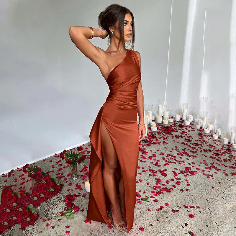 Chic one-shoulder backless slit dress in various colors, including red, apricot, rust, royal, wine red, and more.