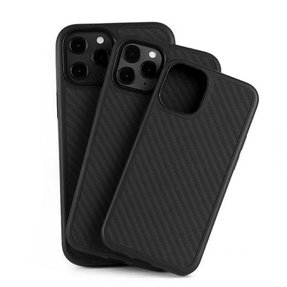 Black solid colour wooden iPhone case with TPU and Kevlar construction on a table.
