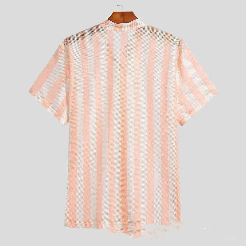 Pink men's short-sleeve waffle-knit shirt with a loose cardigan style on a hanger.