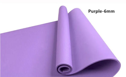 EVA composite fitness and yoga mat in blue, showing its texture and rolled edge next to a storage bag.