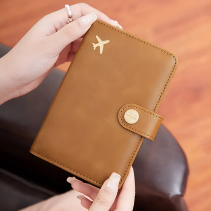 PU passport wallet with sewing line detail, shown in multiple colours including black, pink, and blue, featuring anti-theft swiping protection.