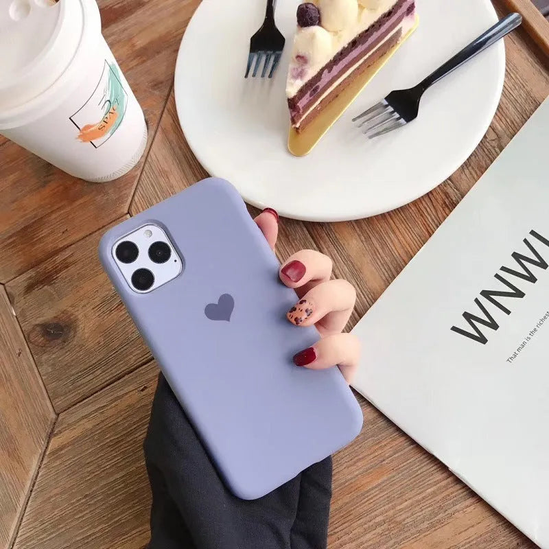 Solid colour silicone iPhone case shown in six colour options including dark green, flour and light pink.