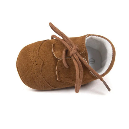 Men's vintage soft-soled baby shoes in synthetic leather, shown in light brown colour