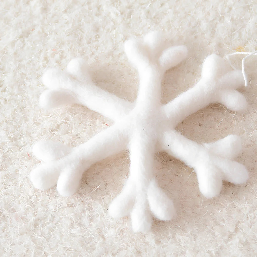 19cm wool felt snowflake and 13cm star Christmas decorations with intricate cut-out patterns