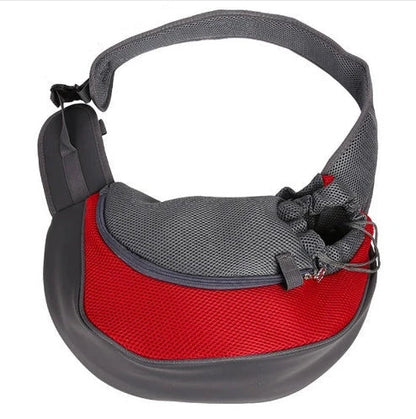 A comfortable and stylish pet sling bag with padded mesh and leather details, allowing hands-free travel for pet owners.