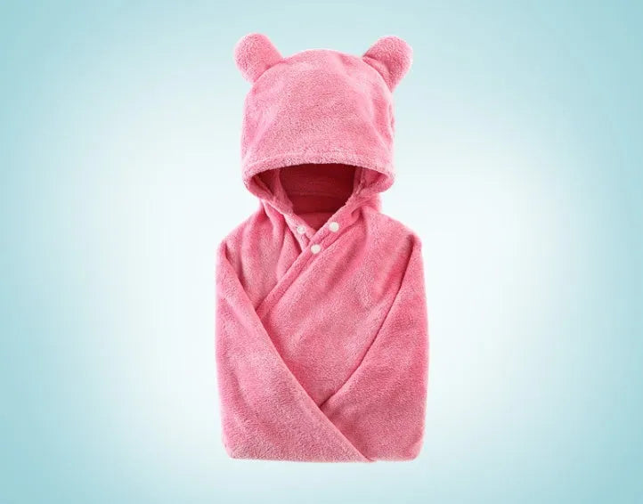 Blue hooded baby bath towel with dimensions 65cm by 110cm laid flat.