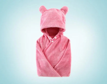 Blue hooded baby bath towel with dimensions 65cm by 110cm laid flat.